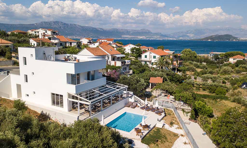 Aerial view of Villa Casablanca, the pool and the sea