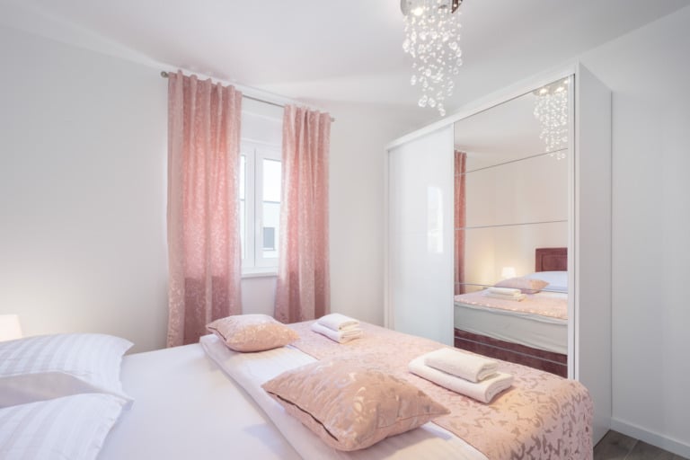 Bright bedroom in the Red Apartment