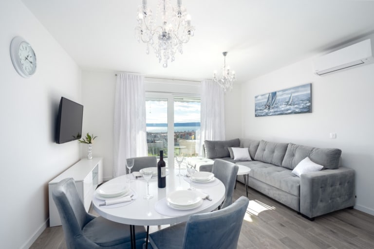 Blue Apartment dining area and sofa